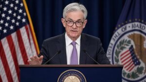 Jerome Powell speaking at the Federal Reserve podium after the April 2026 FOMC meeting